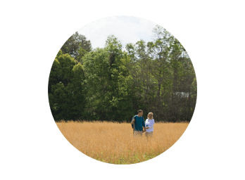 Family outdoors in field